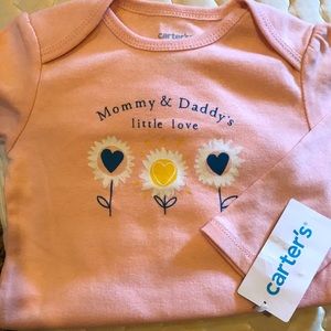 Long sleeve onesie by Carters. NWT. SIZE 12M